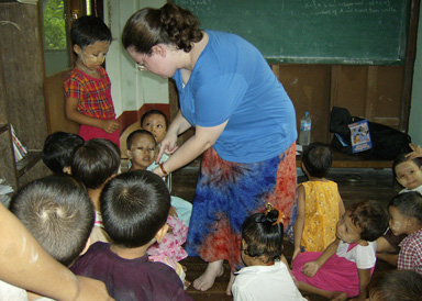 Rebecca teaching Burmese children